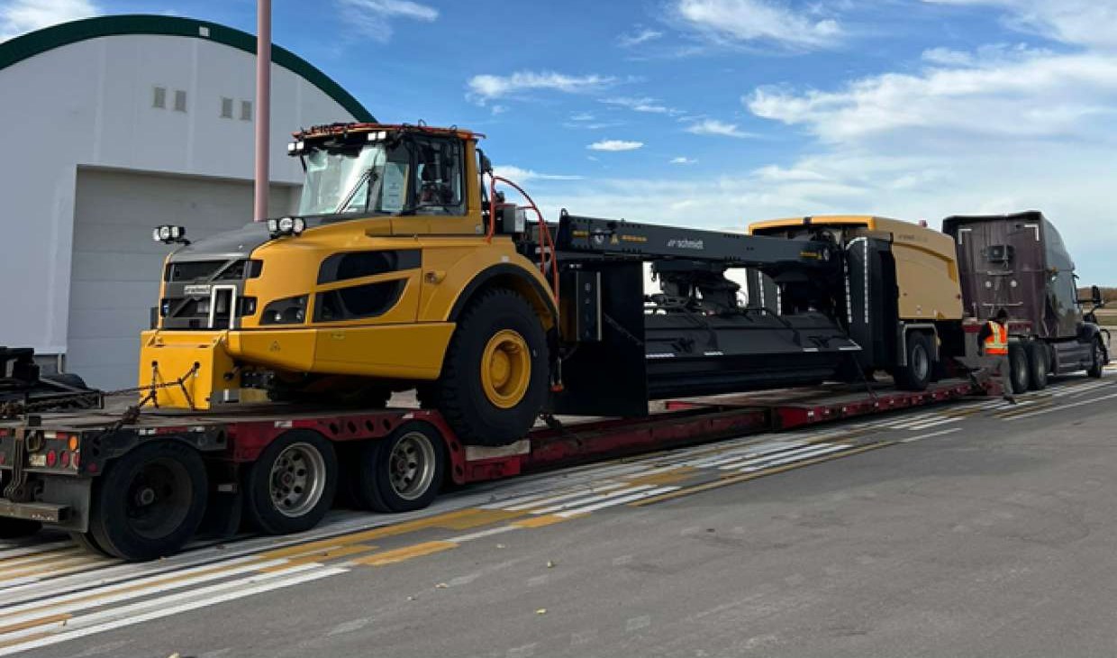 57-ft airport sweeper loaded on RG Roadways stretch RGN trailer